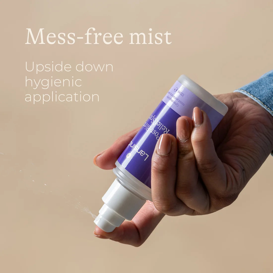 Upside-down application of Lansinoh Post-Birth Relief Spray