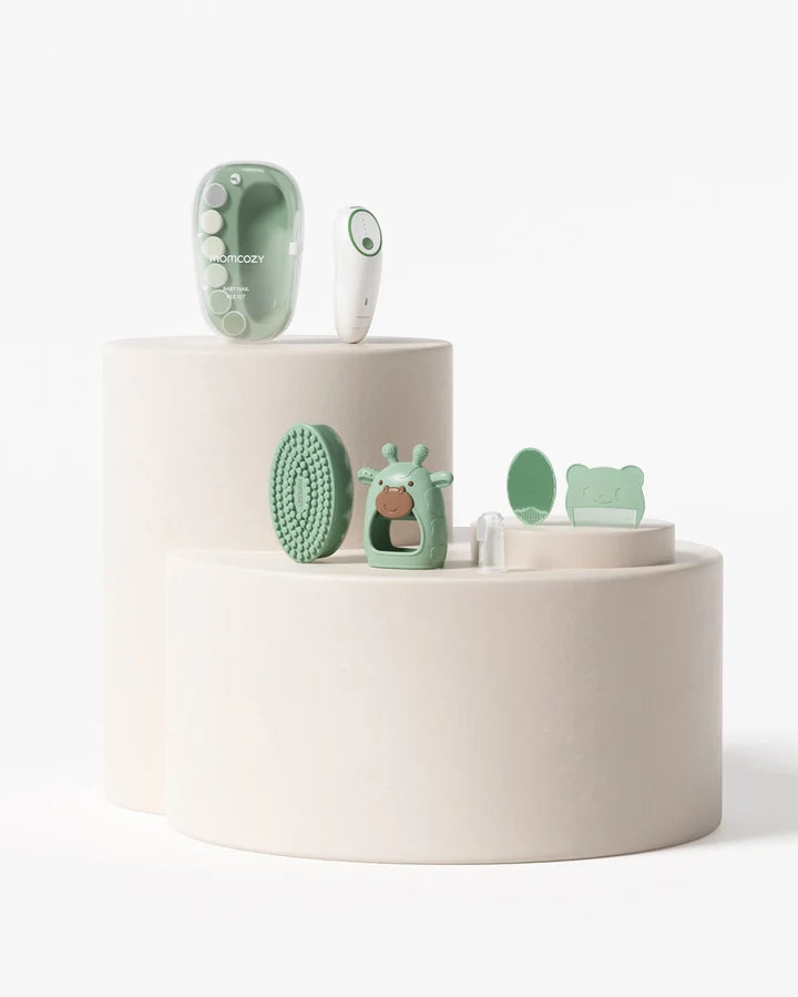 Momcozy All-in-1 Glow Baby Kit with six essentials and retail box