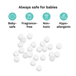 Baby Brezza descaling tablets alongside feeding appliances