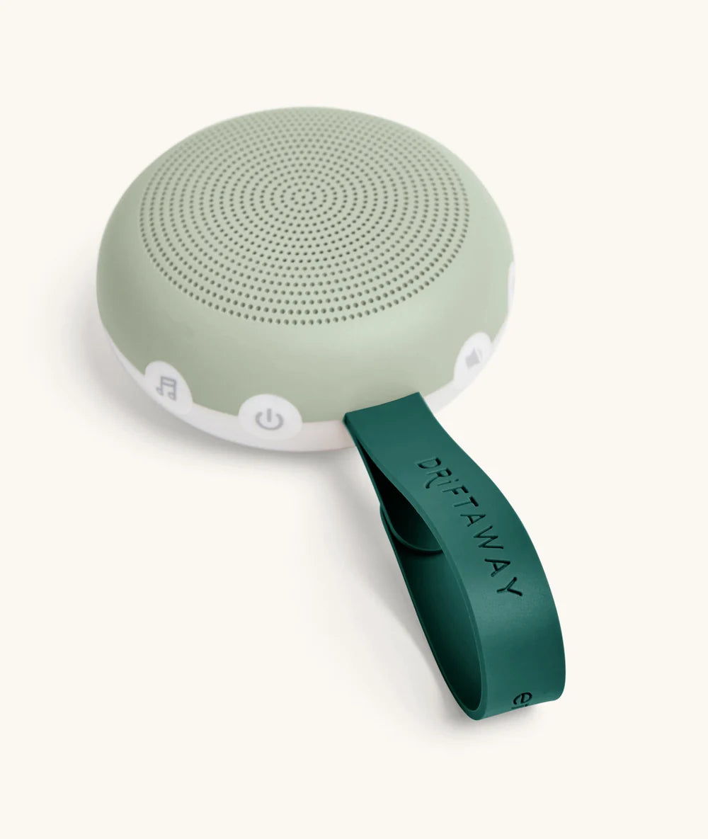 ergoPouch Drift Away white noise machine in sage with attached strap