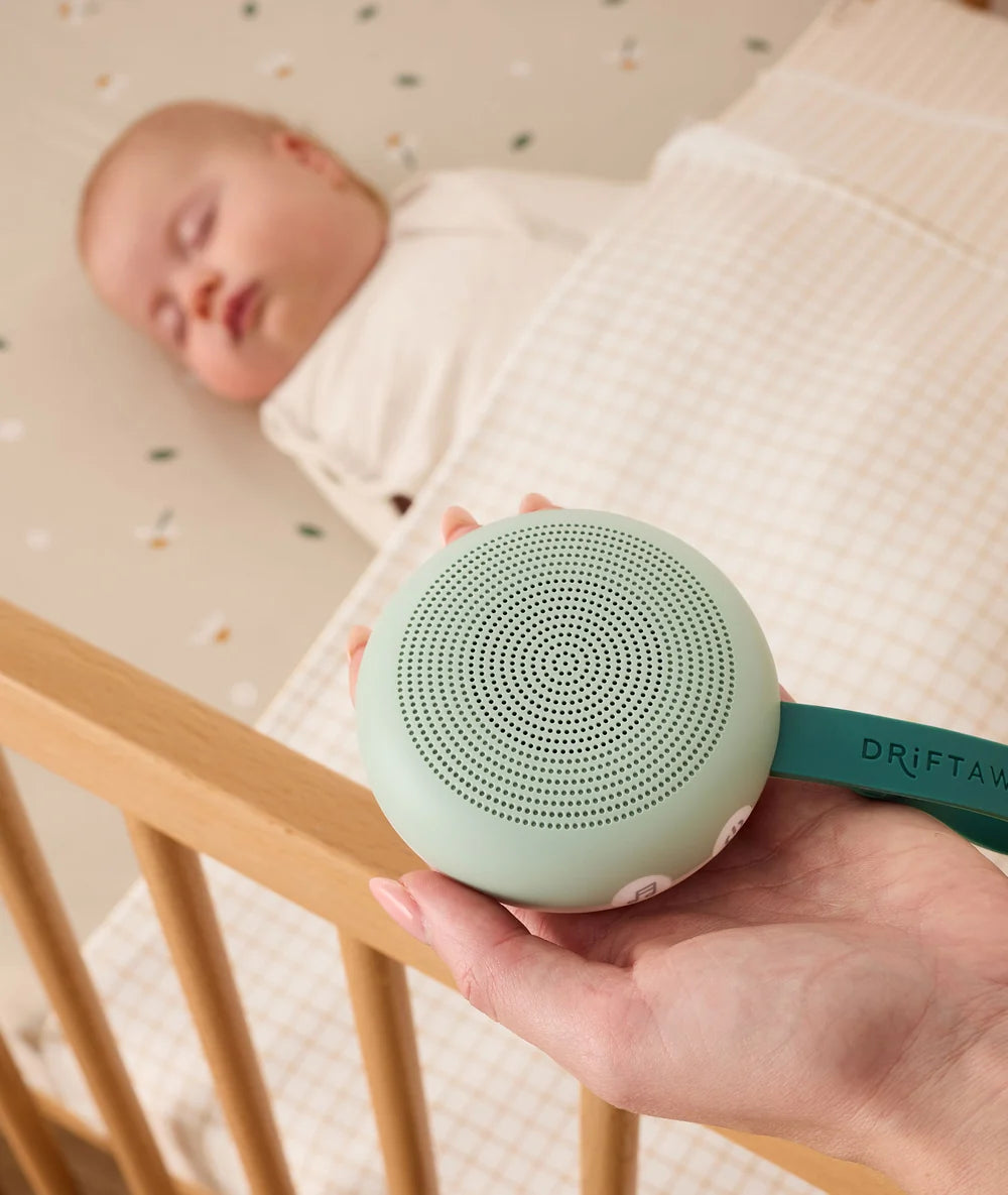 Sage Drift Away machine beside sleeping baby