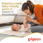 Mother feeding baby with Pigeon SofTouch nursing bottle