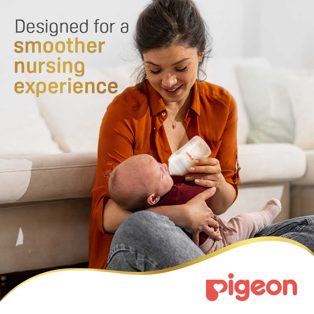 Mother feeding baby with Pigeon SofTouch 160 ml bottle