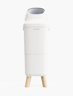 Momcozy Triple-Seal Diaper Pail in white with wood-look legs